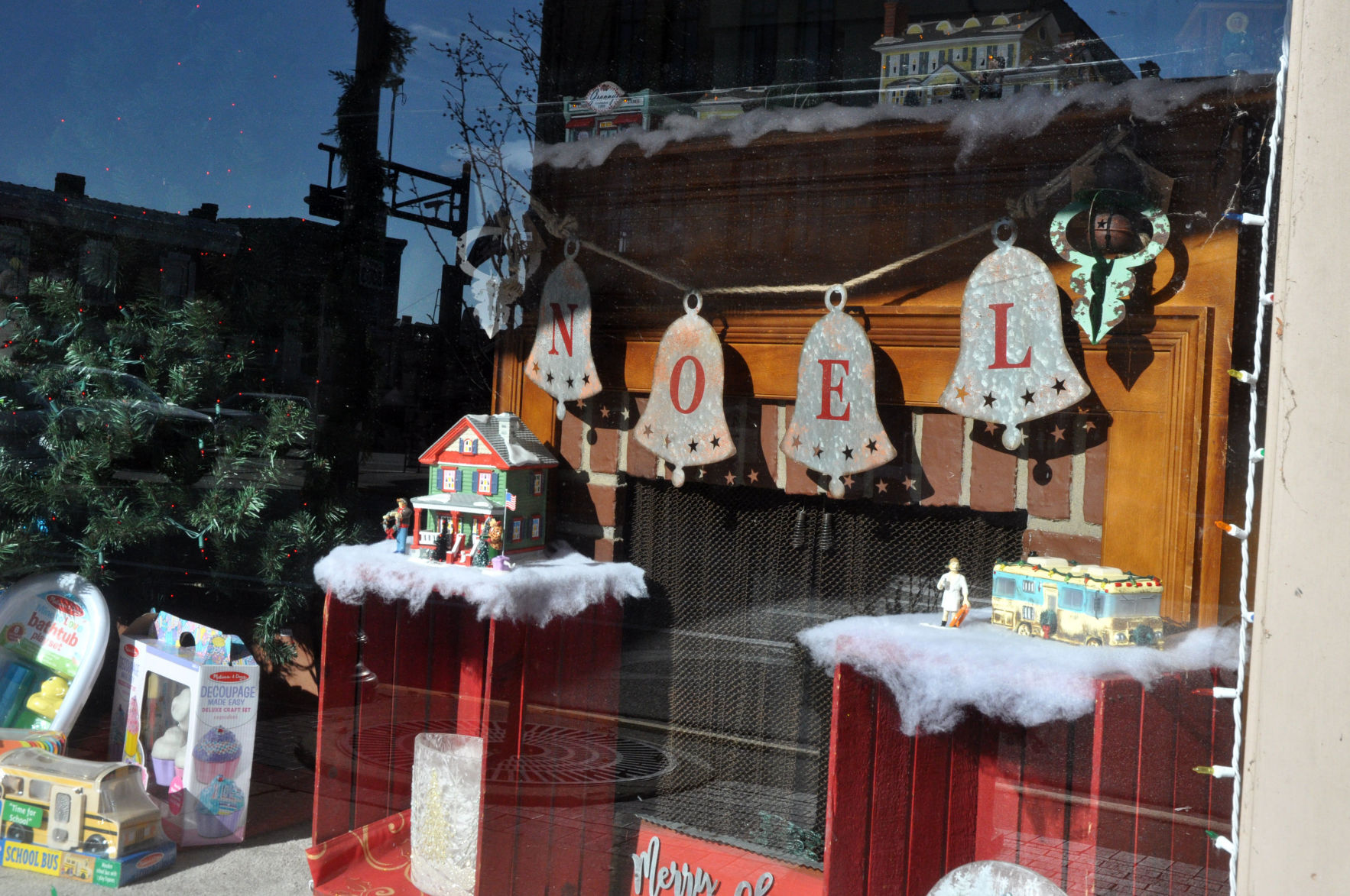 Seasons on the Lake, 757 W. Main St., decorated their storefront window with a fireplace, wishing everyone on a happy Noel and merry Christmas